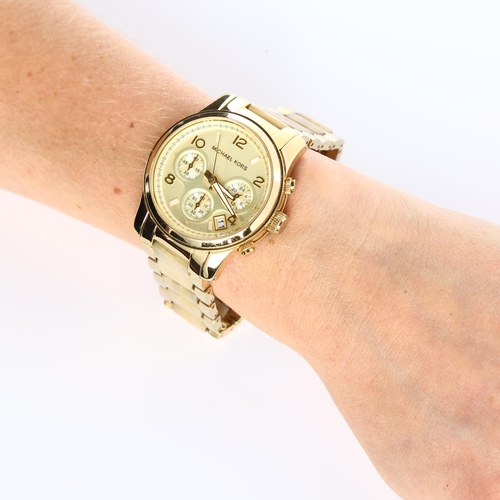 69 - 2 lady's wristwatches, comprising Marc Jacobs and Michael Kors, both working (2)