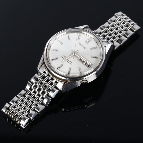 15 - SEIKO - a stainless steel Seikomatic automatic bracelet watch, ref. 6216-9000, silvered dial with ba... 
