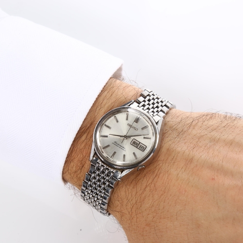 15 - SEIKO - a stainless steel Seikomatic automatic bracelet watch, ref. 6216-9000, silvered dial with ba... 