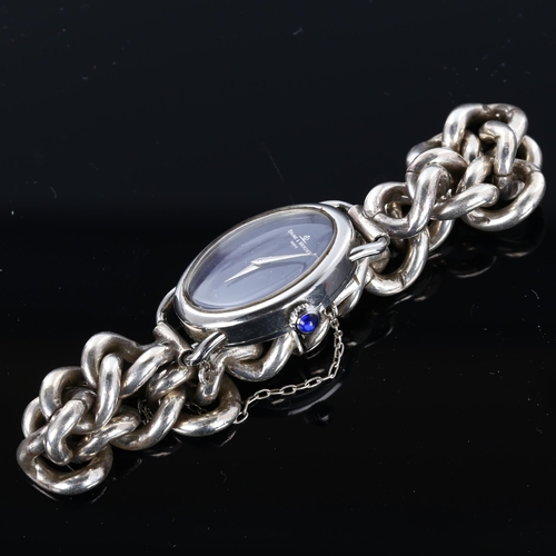 26 - BAUME & MERCIER - a lady's silver mechanical bracelet watch, ref. 1800, oval blue dial with cabochon... 