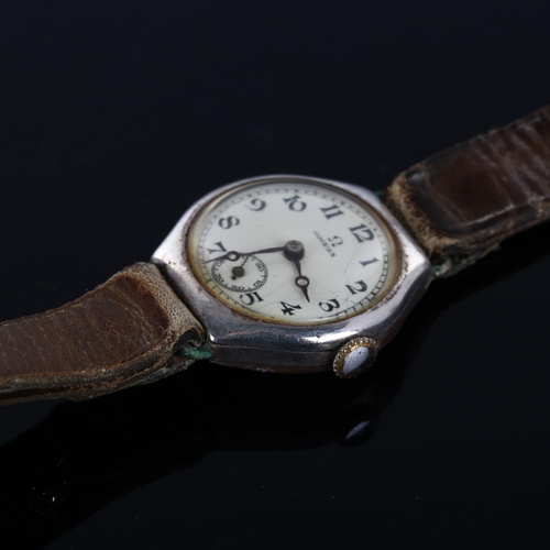 27 - OMEGA - an early 20th century lady's silver mechanical wristwatch, circa 1925, white dial with Arabi... 