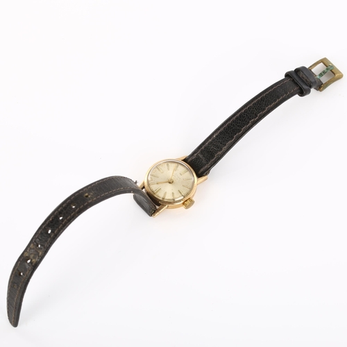 28 - GIRARD PERREGAUX - a lady's 9ct gold mechanical wristwatch, silvered dial with gilt baton hour marke... 