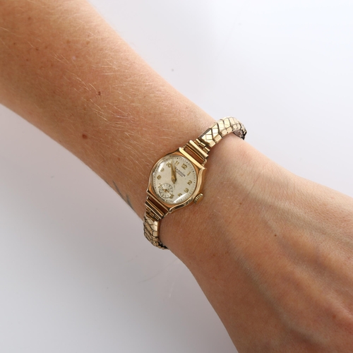 31 - J W BENSON - a lady's 9ct gold mechanical bracelet watch, ref. 87757, silvered dial with gilt Arabic... 