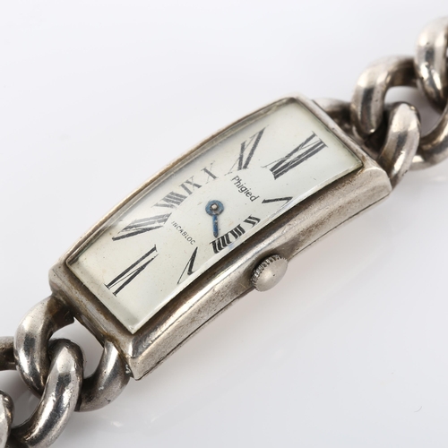 32 - PHIGIED - a lady's heavy sterling silver mechanical bracelet watch, curved rectangular white dial wi... 