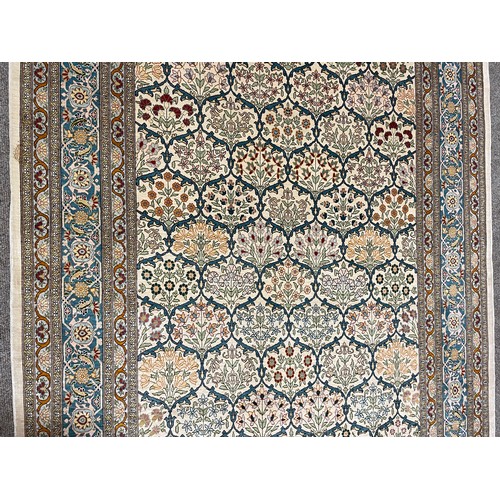 1129 - A Turkish handmade silk rug, 173cm x 108cm