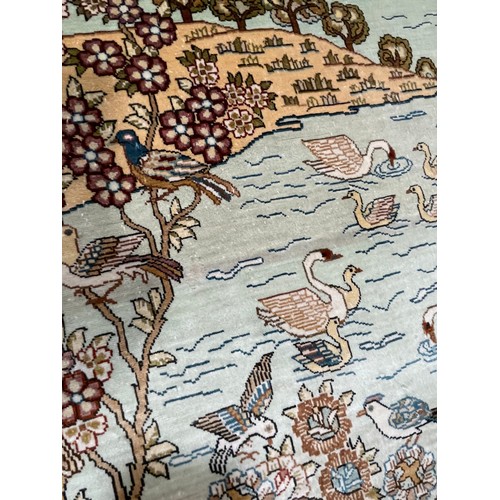 1130 - A Turkish handmade silk rug, 140cm x 93cm