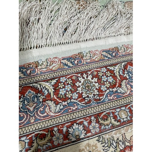 1130 - A Turkish handmade silk rug, 140cm x 93cm