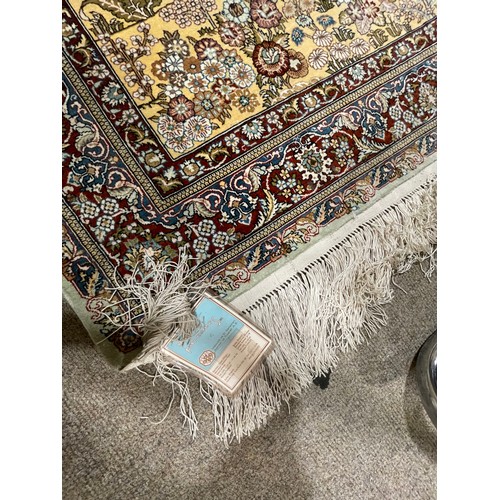 1130 - A Turkish handmade silk rug, 140cm x 93cm