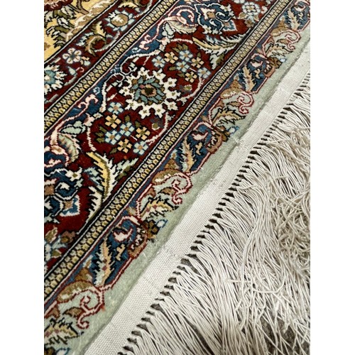 1130 - A Turkish handmade silk rug, 140cm x 93cm