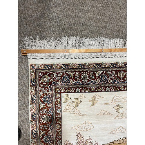 1130 - A Turkish handmade silk rug, 140cm x 93cm