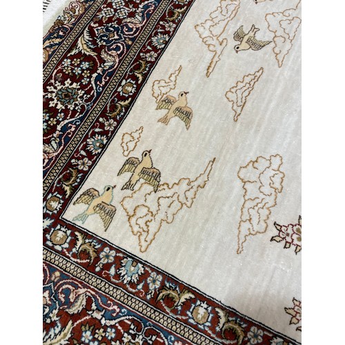 1130 - A Turkish handmade silk rug, 140cm x 93cm