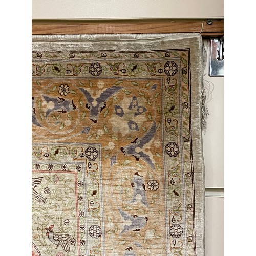 1131 - A Turkish handmade silk rug, 88cm x 60cm