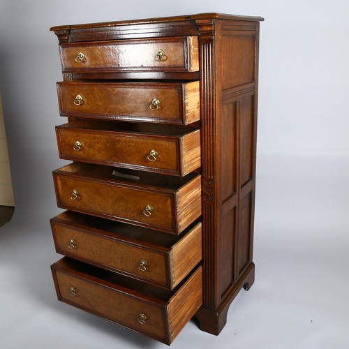 1026 - A 19th century narrow oak chest of 6 drawers with burr-oak drawer fronts, panelled sides, fluted pil... 