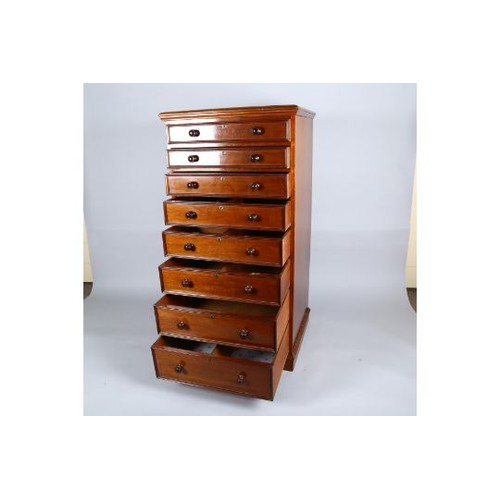 1029 - A good quality 19th century mahogany narrow chest of 8 drawers, with moulded drawer fronts and turne... 