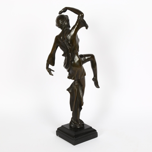 10 - An Art Nouveau style patinated bronze figural sculpture, dancing girl, unsigned, on black marble bas... 
