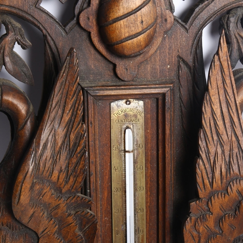 106 - A 19th century oak Heron wall thermometer, height 40cm