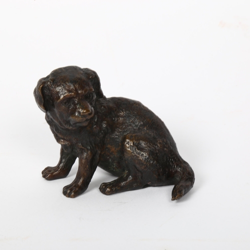 119 - A small patinated bronze figural dog sculpture, indistinctly signed, height 6cm