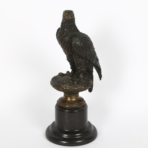 12 - After Archibald Thorburn, a French patinated bronze sculpture, eagle on naturalistic base with Paris... 