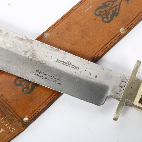 131 - A staghorn-handled bowie knife, by George Wostenholm & Son, with leather sheath, blade length 25cm