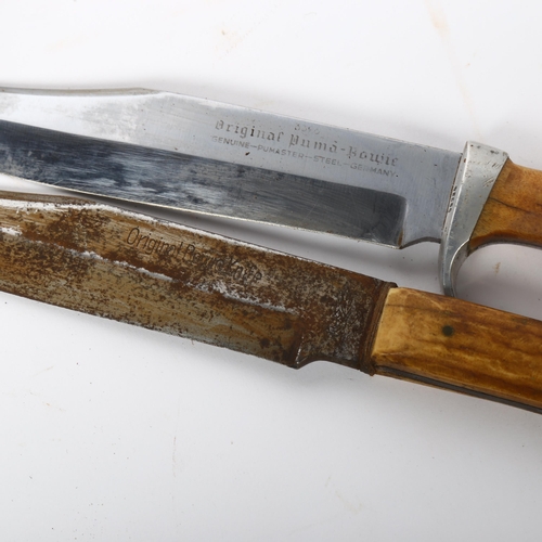 134 - 2 staghorn-handled bowie knives, with leather sheaths (2)
