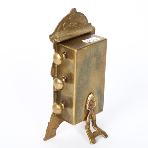 159 - A reproduction brass desk perpetual calendar, height 18cm