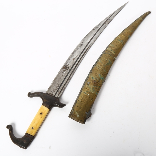 161 - A Middle Eastern bone-handled curved dagger, with brass-covered scabbard, blade length 27cm