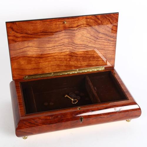 173 - An Italian Sorrento Ware jewellery box, with Swiss musical movement, width 27cm