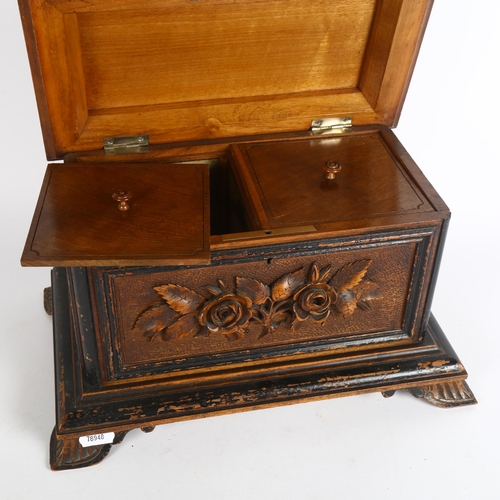 178 - A 19th century carved and stained wood Black Forest tea caddy, with fitted interior, the rising lid ... 