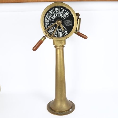 19 - A ship's engine order telegraph, brass frame with oil lantern mount and working handles, height excl... 