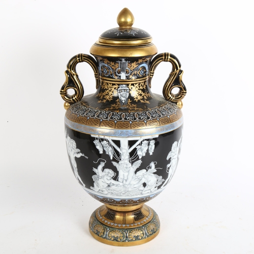 197 - An ornate painted and gilded porcelain vase and cover, height 38cm