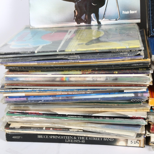 254 - A quantity of vinyl LPs and records, to include David Bowie, Lynyrd Skynyrd, Motley Crue, Fleetwood ... 