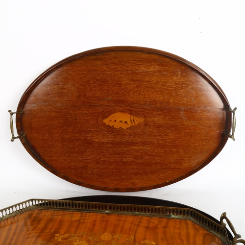 262 - A pair of late Victorian mahogany oval brass-handled serving trays, with decorative shell inlay, and... 