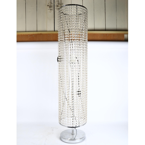 265 - A modern floor standing lamp with plastic lustres, height 112cm