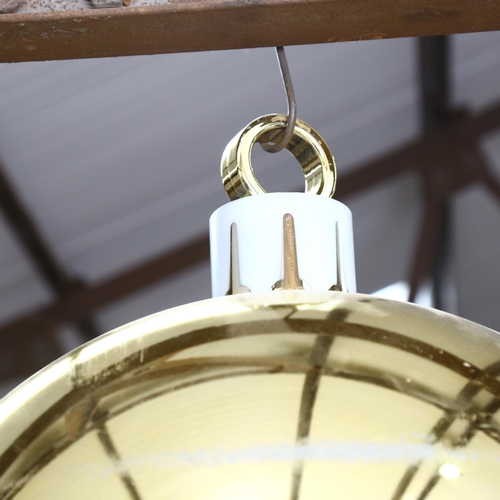 267 - A large decorative Christmas bauble, gold in colour, diameter 52cm