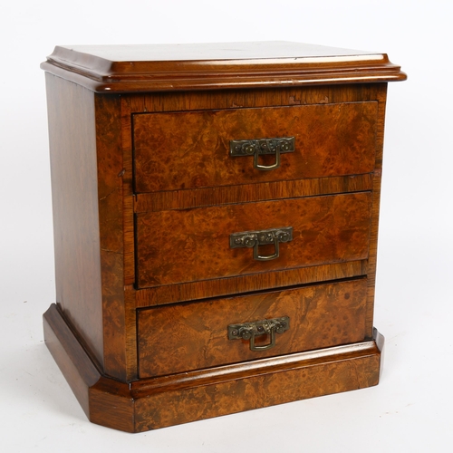 27 - A burr-walnut and mahogany table-top apprentice chest of drawers, with brass drop handles, W29cm, H3... 