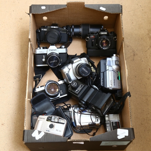 281 - A quantity of Vintage cameras and hand-held video cameras, including Sony Digital Handycam, Canon TL... 