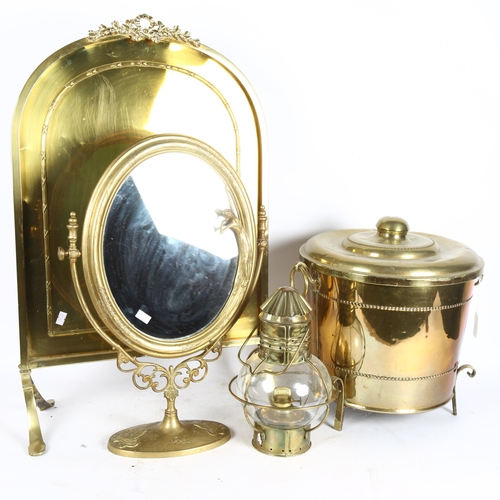 319 - A Wedge oil ship's lamp, a copper food warmer/pot, a modern brass Art Nouveau mirror, and a fire scr... 