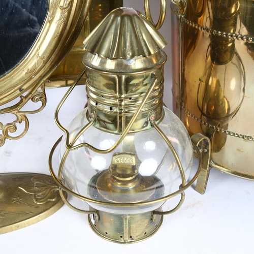 319 - A Wedge oil ship's lamp, a copper food warmer/pot, a modern brass Art Nouveau mirror, and a fire scr... 