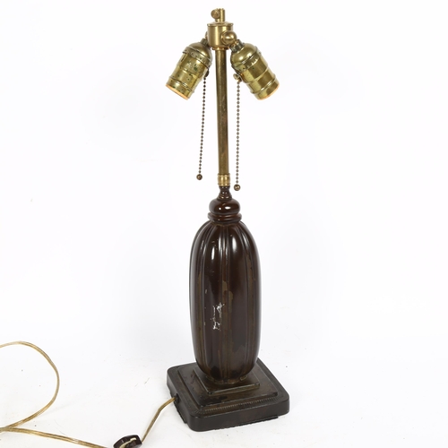 42 - JUST ANDERSEN - an Art Deco Danish Disko metal capsule form table lamp, model no. 1859, with double ... 