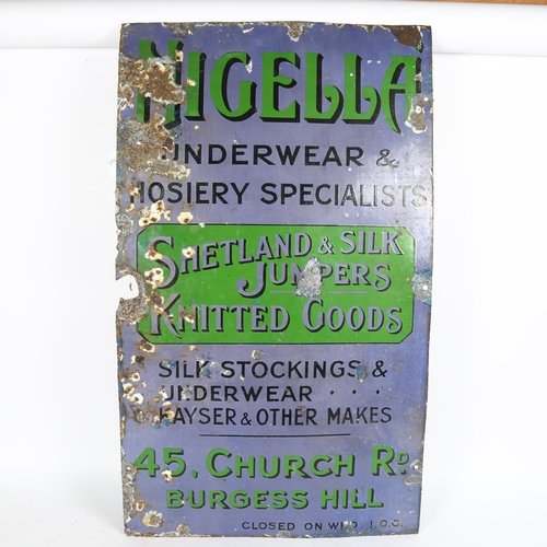 45 - A Vintage Nigella Underwear and Hosiery Specialist's enamel advertising sign, Shetland and Silk Jump... 