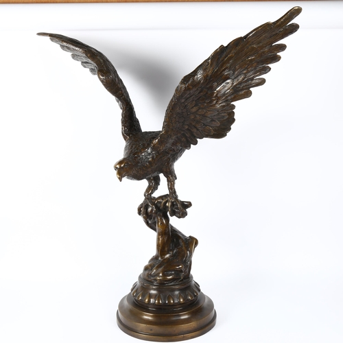 7 - A large reproduction bronzed composition sculpture, eagle perched on branch, unsigned, height 82cm, ... 