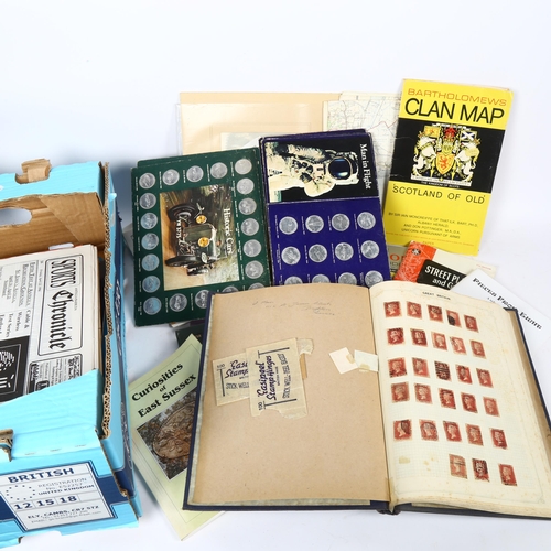 92 - Various postage stamps and collectable tokens, including blue stamp album containing 2 pages of Vict... 