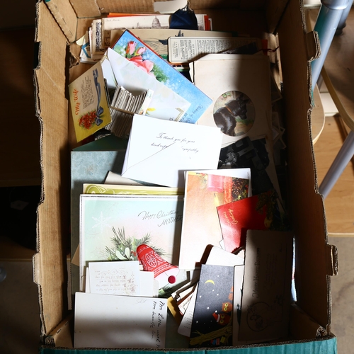 97 - A quantity of postage stamp stock books, cigarette cards, family photographs etc (2 boxes)