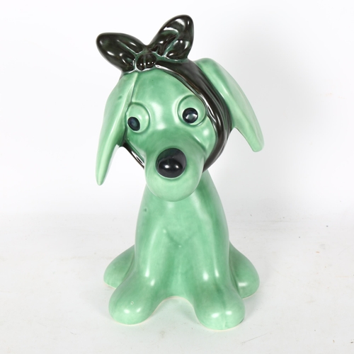 550 - A Sylvac green pottery dog with toothache, 2451, 26cm