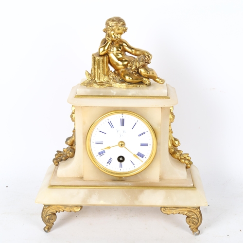 557 - A marble and gilt-metal mantel clock, surmounted by a cherub, height 29cm