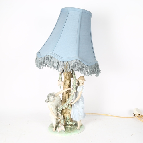 561 - Lladro porcelain table lamp, L1607, with shade, height 59cm overall