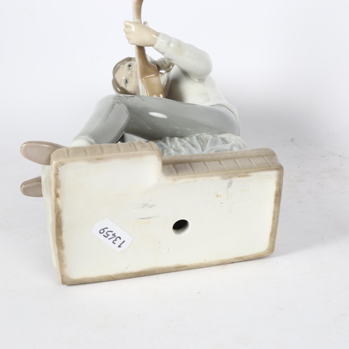 567 - NAO sculpture of a girl playing a guitar, 25cm