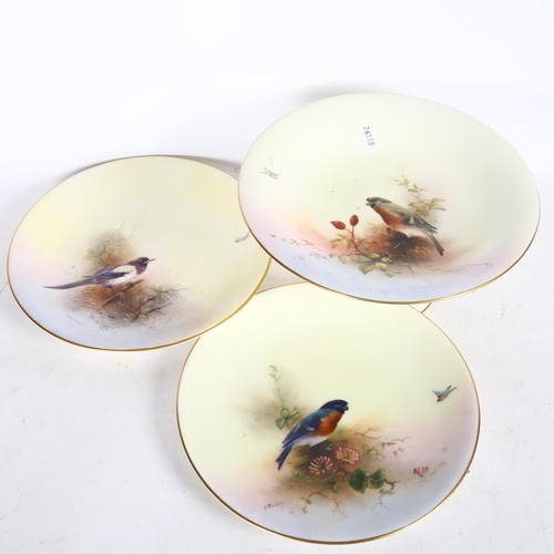 703 - 3 Royal Worcester plates - Magpie by Charles Stinton, a bullfinch comport and plate by E Barker, 23c... 