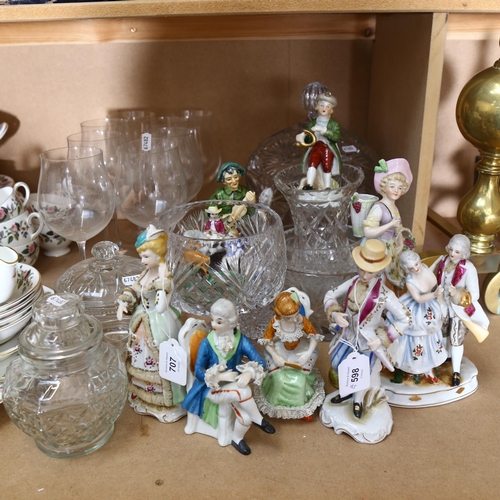 707 - A large glass punch bowl and carver, fruit bowls, vases, goblets, various Continental figures etc