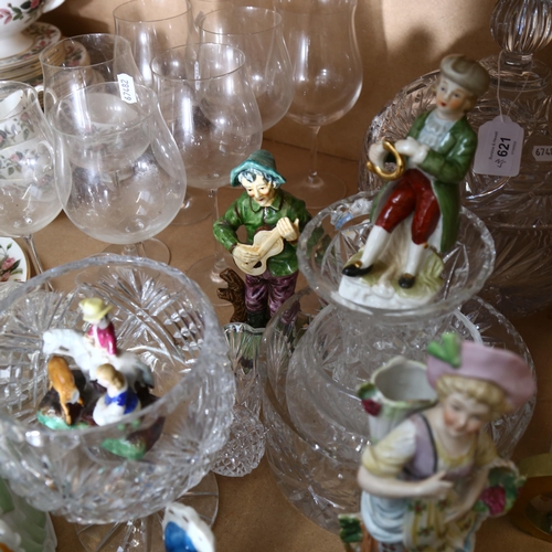 707 - A large glass punch bowl and carver, fruit bowls, vases, goblets, various Continental figures etc